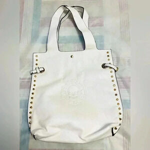 White bag with 💀 . No  name no brand